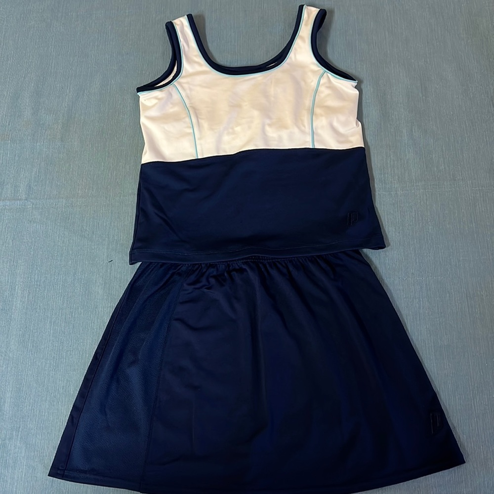 Prince women’s tennis outfit. Navy and white. Size small. Excellent condition.